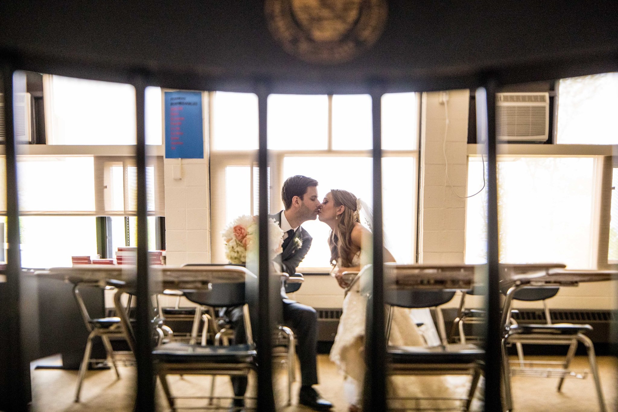 Nine years later and first day as husband and wife they got to finally sneak a kiss in one of the first places they ever passed notes